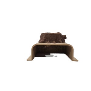 May include: A brown tree stump on a beige wooden platform with a curved opening. The platform is designed to be used as a small animal habitat.