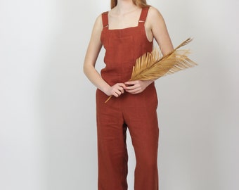 Linen jumpsuit for women in terracotta brown. Wide legs summer jumpsuit with pockets and waist ties. Handmade linen overall, front pocket.