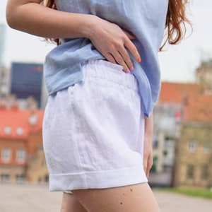 Classic white linen shorts for women. Minimalis shorts with pockets. Elastic waist shorts low rise. Stylish Loose linen shorts for summer. image 2