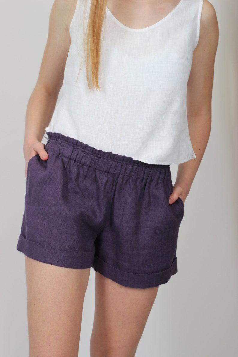 Classic white linen shorts for women. Minimalis shorts with pockets. Elastic waist shorts low rise. Stylish Loose linen shorts for summer. image 6