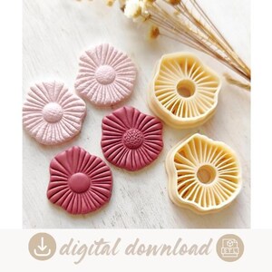 May include: Three circular flower-shaped clay pieces in light pink, dark pink, and maroon, alongside two beige plastic cookie cutters with radial petal patterns. The text digital download is displayed at the bottom of the image.