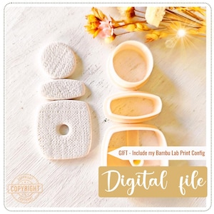 May include: A collection of white, textured cookie cutters and baked cookies. The cutters are in various shapes, including round, oval, and square with a hole. The image also includes text that says "Digital file".
