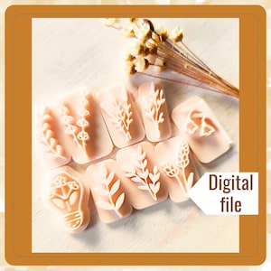 Op de afbeelding: Set van negen witte plastic stempels met bloemmotieven. De stempels zijn in een halve cirkel op een wit oppervlak gerangschikt. De tekst "Digitaal bestand" is zichtbaar in de rechterbenedenhoek van de afbeelding.