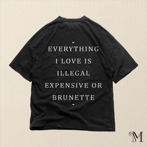Funny Sarcastic Graphic Tee: Everything I Love Is Illegal Expensive Or Brunette Quote Shirt