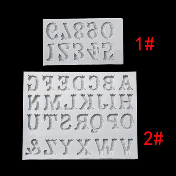 Moulds modelling numbers and Alphabet - Planète Gateau