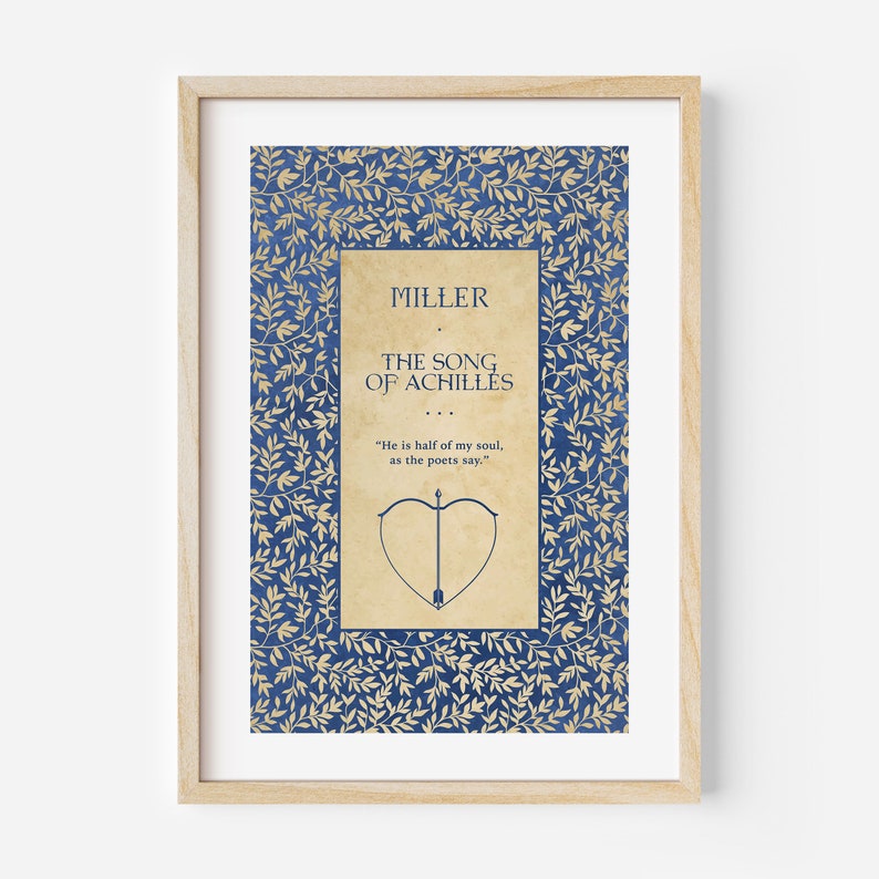 May include: A framed print of a book cover with a blue and gold floral pattern. The title of the book is "The Song of Achilles" by Madeline Miller. The quote "He is half of my soul, as the poets say." is printed below the title.