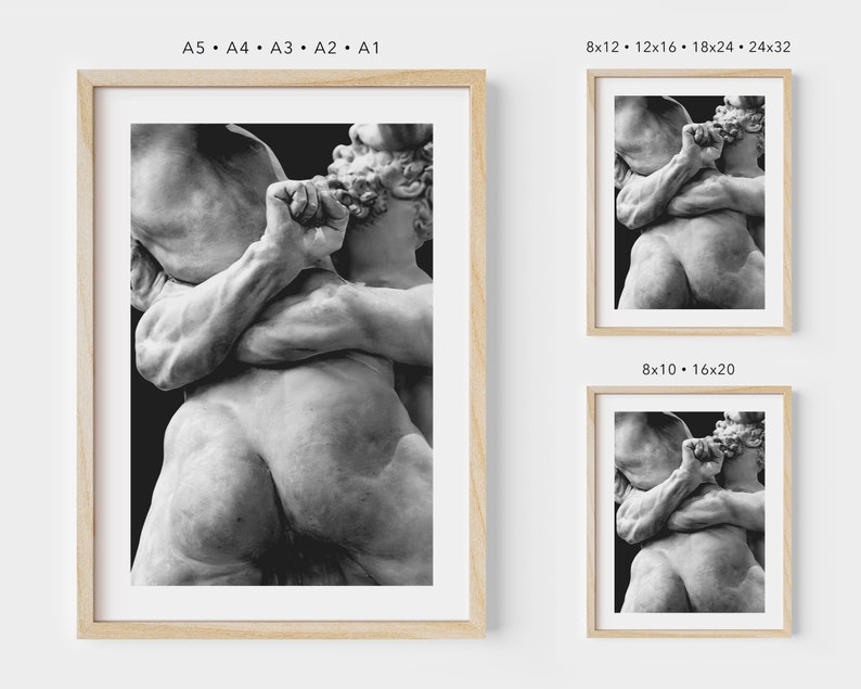 May include: Framed black and white print of a classical sculpture depicting two figures embracing. The artwork is displayed in various sizes, including 8x12, 12x16, 18x24, and 24x32 inches, with a natural wood frame.
