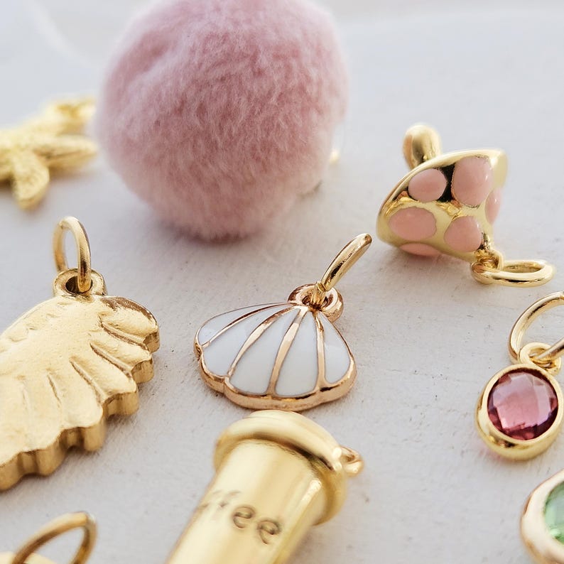 Charms vergoldet kleine Anhänger für Creolen Armbänder Eiffelturm Pilz böser Blick Seestern gold Blatt Süßwasserperle Muschel Tropfen Münze