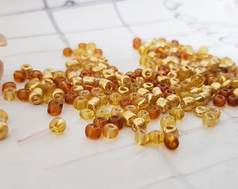 Perlenmischung 100 Stck. 4mm Fb. gelb topaz gold Glasperlen Glas Silberfolie