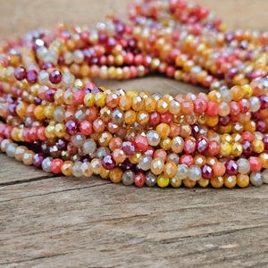 1 Strang Glasperlen 3mm x 2,5mm galvanisiert bunt Glasperlen Mischung facettiert geschliffen Fb. orange rot gelb bordeaux