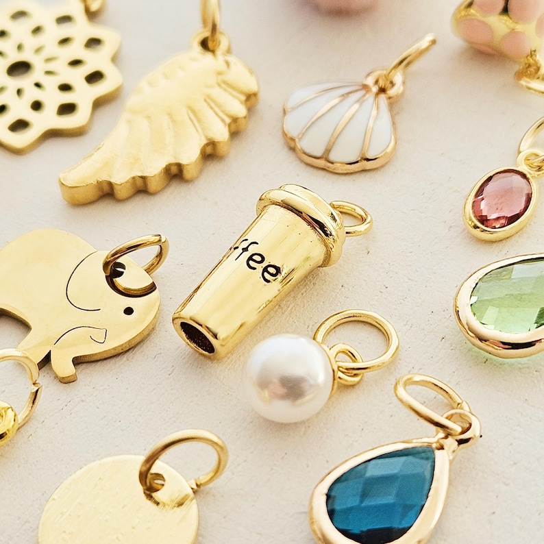 Charms vergoldet kleine Anhänger für Creolen Armbänder Eiffelturm Pilz böser Blick Seestern gold Blatt Süßwasserperle Muschel Tropfen Münze