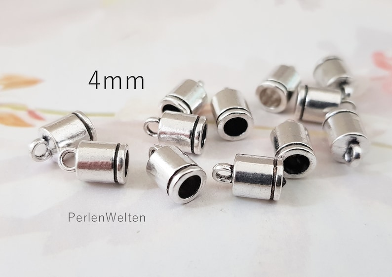 20 Endkappen 4mm Metall Fb. silber für Bänder Bandkappen Enden Bandenden mit Öse Bild 1