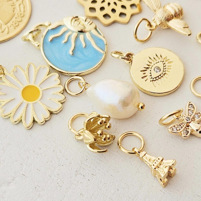 Charms vergoldet kleine Anhänger für Creolen Armbänder Eiffelturm Pilz böser Blick Seestern gold Blatt Süßwasserperle Muschel Tropfen Münze