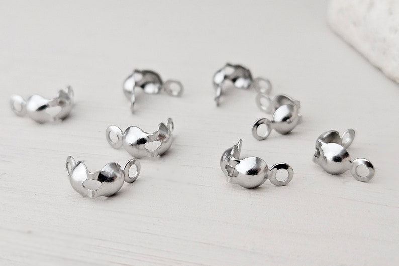 Stainless steel crimp caps 8 x 4 mm, surgical. Stainless steel domes color silver domes image 1