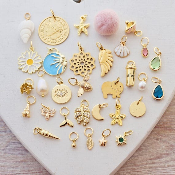 Charms vergoldet kleine Anhänger für Creolen Armbänder Eiffelturm Pilz böser Blick Seestern gold Blatt Süßwasserperle Muschel Tropfen Münze