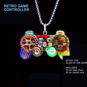 May include: A pendant shaped like a retro game controller featuring embedded gears, electronic components, and a smiley face, suspended from a chain. Text includes RETRO GAME CONTROLLER, STYLE G16 GLOW IN THE DARK, and INCLUDES 70 cm steel chain 50 cm waxed cord.