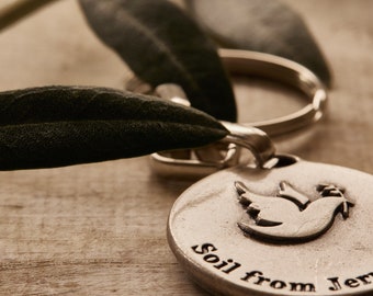 Symbolic beautiful keychain a piece of art. Handmade & authentic soil from Gethsemani in Jerusalem. Support Israel.
