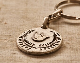 Silver Dove and olive leaves necklace a symbol of peace ,pendant with sacred soil from the Garden of Gethsemani in Jerusalem.