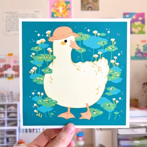 Impresión artística de pato con sombrero de pescador (verde azulado) / Arte de pared bonito