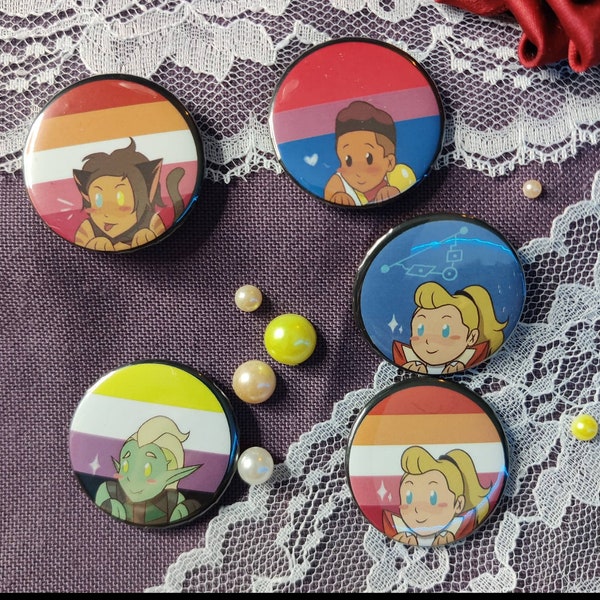 Pride She-Ra 35mm badges _ Adora, Catra, Bow, Glimmer, Double-Trouble, Entrapta, Perfuma, Scorpia, Mermista, Mara, Sea hawk, Netossa,...