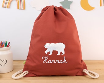 Rust-colored organic children's gym bag personalized with name