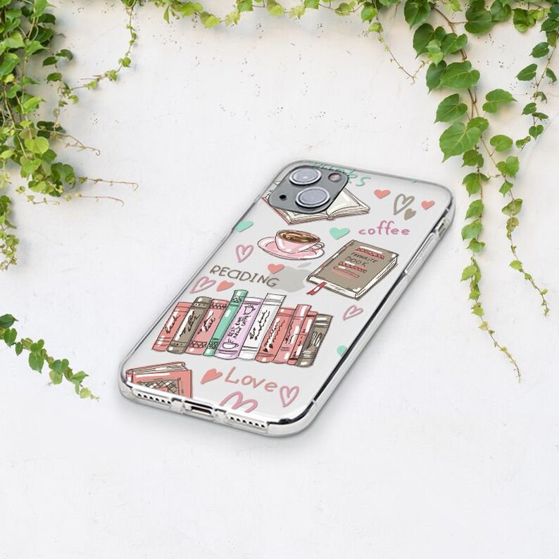 May include: A clear phone case with a colorful design featuring books, coffee cups, hearts, and the words "Reading", "Love", and "Coffee".