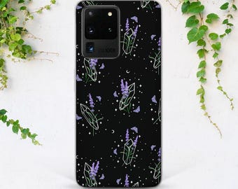 May include: A black phone case with a pattern of purple lavender flowers, white crystals, and butterflies on a black background.