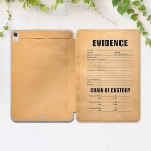 May include: A brown paper evidence envelope with a chain of custody form. The form has fields for agency, item number, date of collection, collected by, description of evidence, location of collection, type of offense, victim, suspect, received from, date, time, and by.