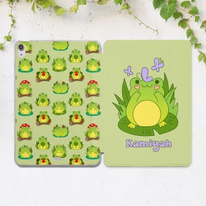May include: A green tablet case with a frog pattern on the front and a single frog with the name "Kamiyah" on the back.