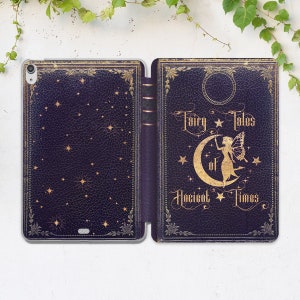 May include: A dark blue iPad case with a gold-colored design. The case is open, revealing a starry pattern on the left side and the words "Fairy Tales of Ancient Times" with a fairy illustration on the right side.