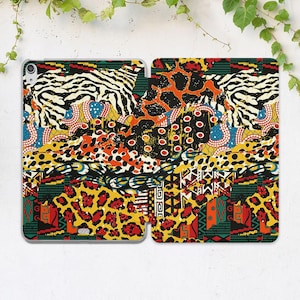 May include: An open iPad case featuring a vibrant patchwork design. The case showcases a mix of animal prints, including zebra and leopard patterns, alongside geometric and abstract shapes in a palette of red, yellow, blue, and black.