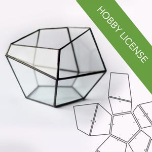 May include: A black metal geometric terrarium with a clear glass interior. A diagram of the terrarium's construction is shown below. The diagram is labeled with numbers 1 through 10. HOBBY LICENSE is written in green text on a green background.
