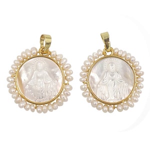 May include: Two gold-toned pendants with a white mother of pearl inlay featuring a religious figure. Each pendant is surrounded by a circle of white pearls.