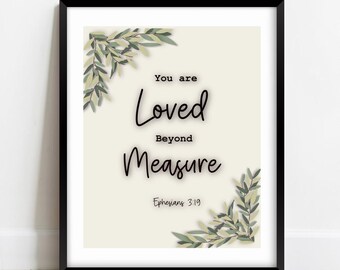 May include: A beige printable wall art print with green leaves and the text "You are loved beyond measure Ephesians 3:19".