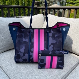 How cute is this neoprene tote! If you love the Louis Vuitton