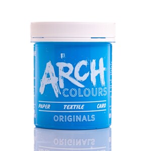 May include: A blue plastic jar of Arch Colours Originals paint. The jar has a white lid and the text "Arch Colours Originals" is printed on the front. The jar is labeled "Paper, Textile, Caro".
