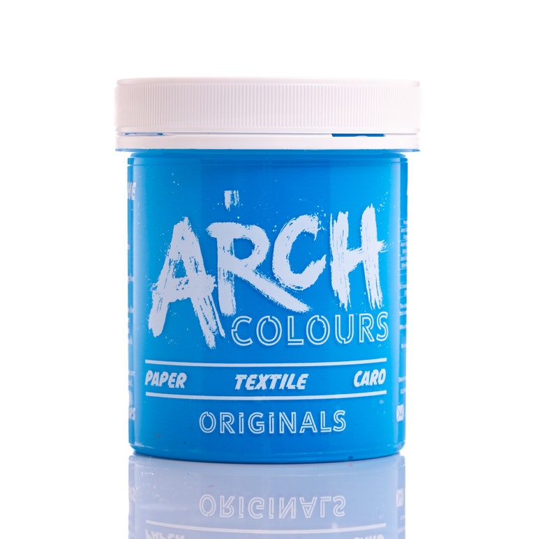 May include: A blue plastic jar of Arch Colours Originals paint. The jar has a white lid and the text "Arch Colours Originals" is printed on the front. The jar is labeled "Paper, Textile, Caro".