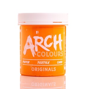 May include: Orange colored jar of paint with a white lid. The jar has the text "ARCH COLOURS" in white lettering and the words "PAPER TEXTILE CARO ORIGINALS" in white lettering.