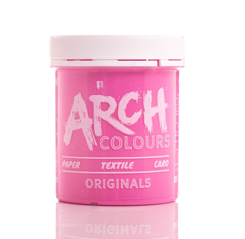 May include: A pink jar of Arch Colours dye for paper, textile, and card. The jar has a white lid and the text "ARCH COLOURS ORIGINALS" is printed on the front.