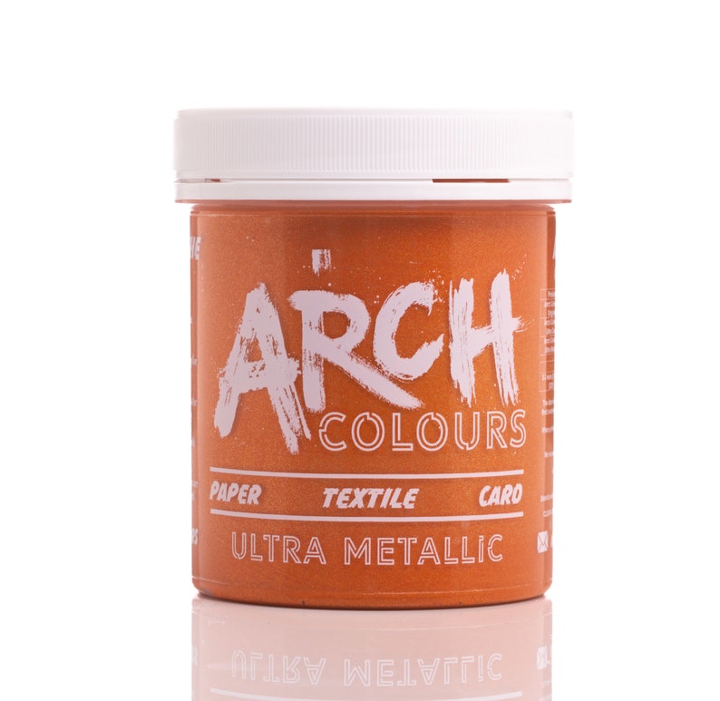 May include: A round orange jar with a white lid. The jar is labeled "ARCH COLOURS" and "ULTRA METALLIC". The jar is for paper, textile, and card.