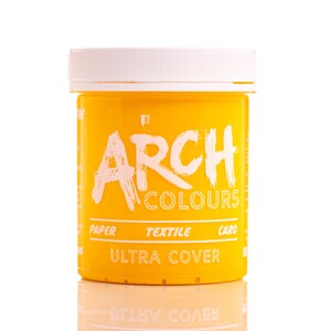 May include: A yellow plastic jar of fabric dye with the text "ARCH COLOURS" and "ULTRA COVER" printed on the label. The jar is labeled for use on paper, textile, and card.