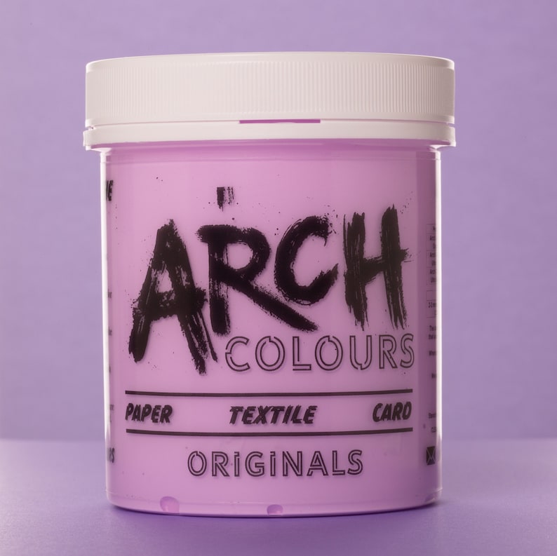 May include: A pink jar of Arch Colours paint. The jar has a white lid and black text that says "Arch Colours" and "Originals". The jar also has black text that says "Paper", "Textile", and "Card".