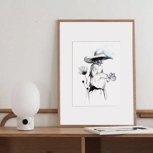 Modeillustration einer Frau mit nacktem Rücken und Hut in Tusche