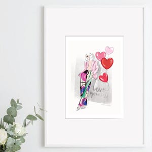 Peut inclure: Impression aquarelle d'une silhouette tenant des ballons en forme de cœur. La figure porte une veste rose et une tenue à motifs colorés. L'inscription « Love yourself » est visible en arrière-plan.