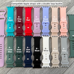K&ouml;nnte beinhalten: Eine Auswahl an Apple Watch-Armb&auml;ndern mit Doppelschleife. Die Armb&auml;nder sind in verschiedenen Farben erh&auml;ltlich, darunter Aqua, Weinrot, Rot, Hellviolett, Royalviolett, Sandrosa, Limonenrosa, Kadettenblau, Schiefergr&uuml;n, Dunkelblau, Schwarz, Wei&szlig;, Beige und Grau.