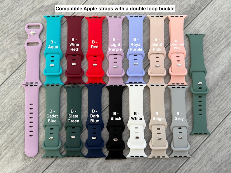 K&ouml;nnte beinhalten: Eine Auswahl an Apple Watch-Armb&auml;ndern mit Doppelschleife. Die Armb&auml;nder sind in verschiedenen Farben erh&auml;ltlich, darunter Aqua, Weinrot, Rot, Hellviolett, Royalviolett, Sandrosa, Limonenrosa, Kadettenblau, Schiefergr&uuml;n, Dunkelblau, Schwarz, Wei&szlig;, Beige und Grau.
