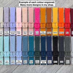 May include: A collection of engraved watch bands in various colors, including beige, grey, purple, pink, and blue. Each band has a unique design and buckle. Text on the image reads "Example of each colour engraved. Many more designs in my shop."
