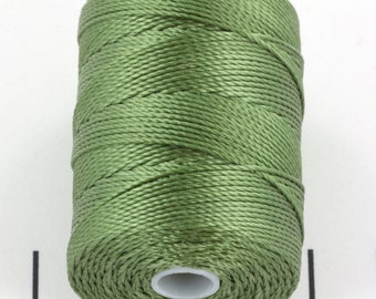 May include: A spool of green nylon cord.