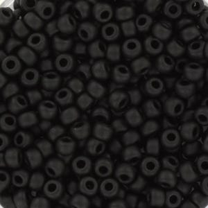 May include: A close-up of a collection of small, matte black seed beads. The beads are cylindrical with a hole through the centre, suitable for stringing. These beads are ideal for jewellery making and craft projects.