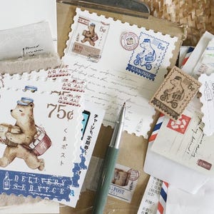 NOUVEAU ! Projet Black Milk - Kuma Cartes postales